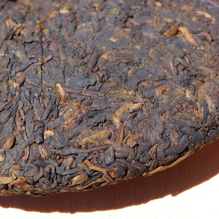 2009 Long Xin Tang "Nan Nuo Shan" Ripe Pu-erh Tea Cake | Yunnan Sourcing Tea Shop