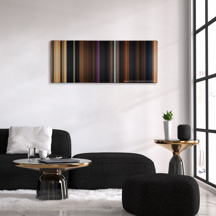 Beauty and the Beast color palette canvas above a black sofa with a gold-topped table
