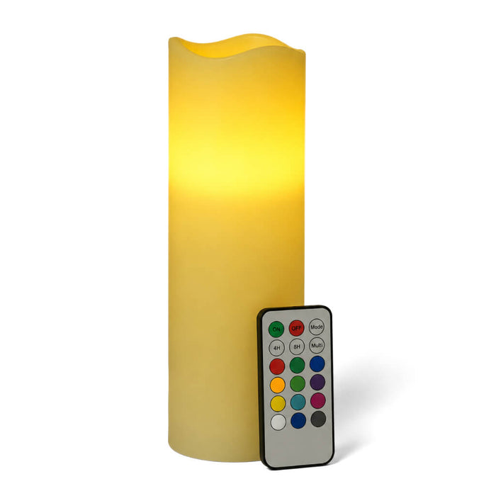 Yellow flameless pillar candle and remote on clean white backdrop