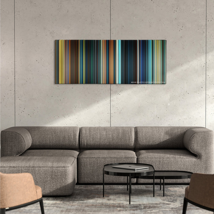 The Lord of the Rings: The Fellowship of the Ring color palette canvas on a concrete wall above a gray sectional sofa