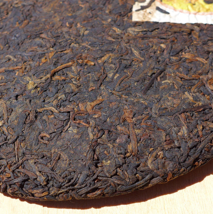 2009 Long Xin Tang "Nan Nuo Shan" Ripe Pu-erh Tea Cake | Yunnan Sourcing Tea Shop
