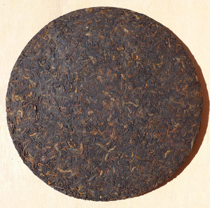 2010 Long Xin Tang Gong Ting Ripe Pu-erh tea cake of Menghai | Yunnan Sourcing Tea Shop