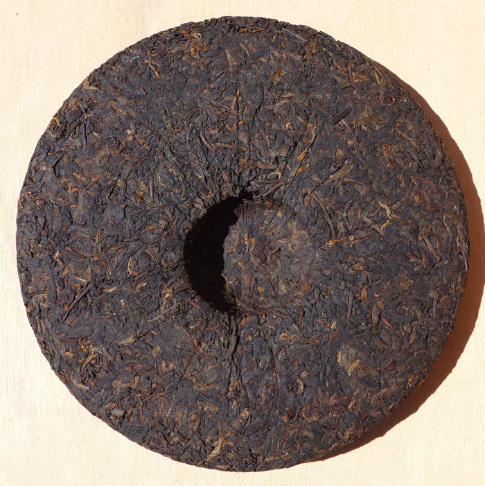 2010 Long Xin Tang Gong Ting Ripe Pu-erh tea cake of Menghai | Yunnan Sourcing Tea Shop