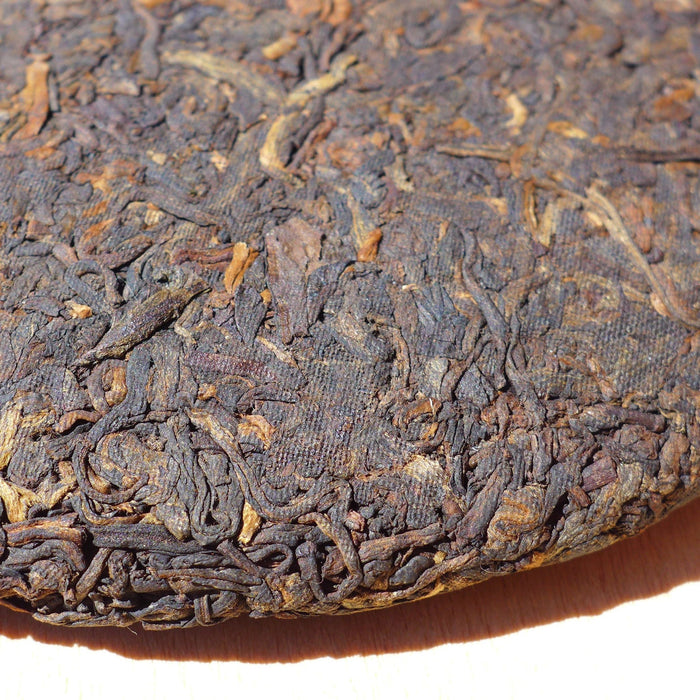 2010 Long Xin Tang Gong Ting Ripe Pu-erh tea cake of Menghai | Yunnan Sourcing Tea Shop