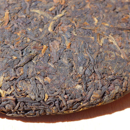 2010 Long Xin Tang Gong Ting Ripe Pu-erh tea cake of Menghai | Yunnan Sourcing Tea Shop