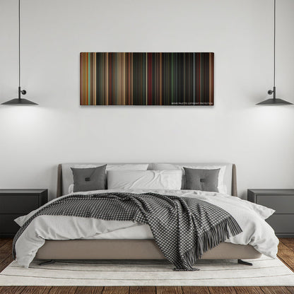 Angels & Demons color palette canvas above a bed, between two black pendant lamps