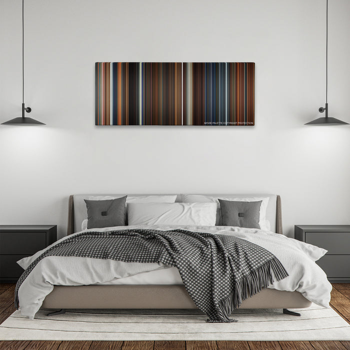 Ant-Man color palette canvas above a bed, between two black pendant lamps