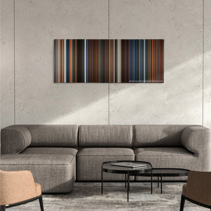 Ant-Man color palette canvas on a concrete wall above a gray sectional sofa