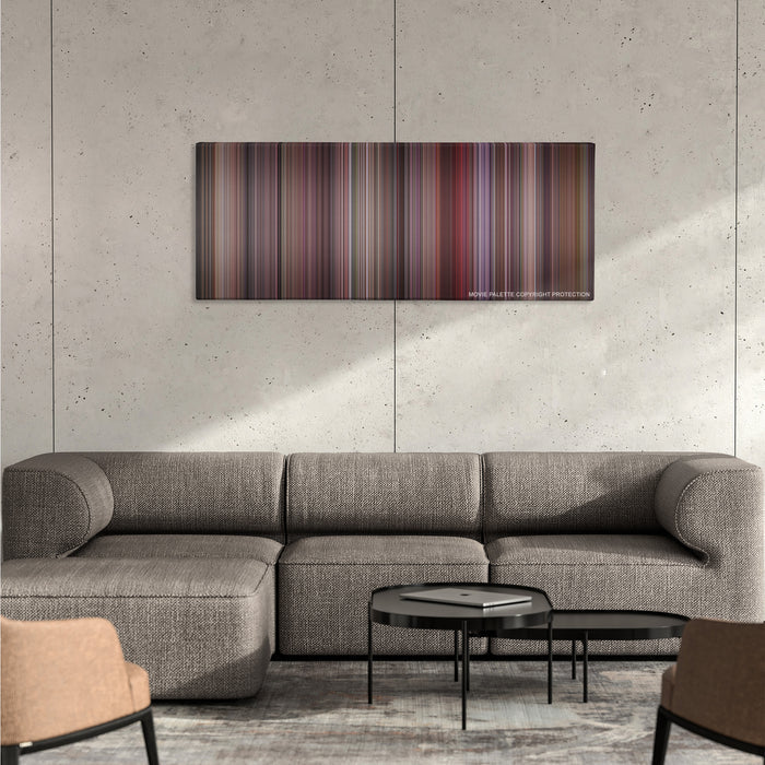 Breakfast at Tiffany's color palette canvas on a concrete wall above a gray sectional sofa
