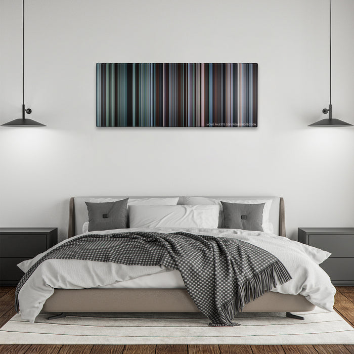 Brokeback Mountain color palette canvas above a bed, between two black pendant lamps