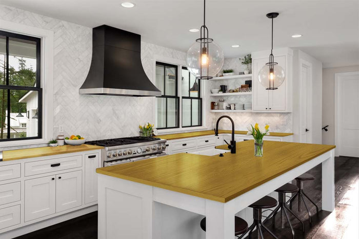Retique It Old Oak countertop kit stain applied to a kitchen countertop with a natural wood grain finish.