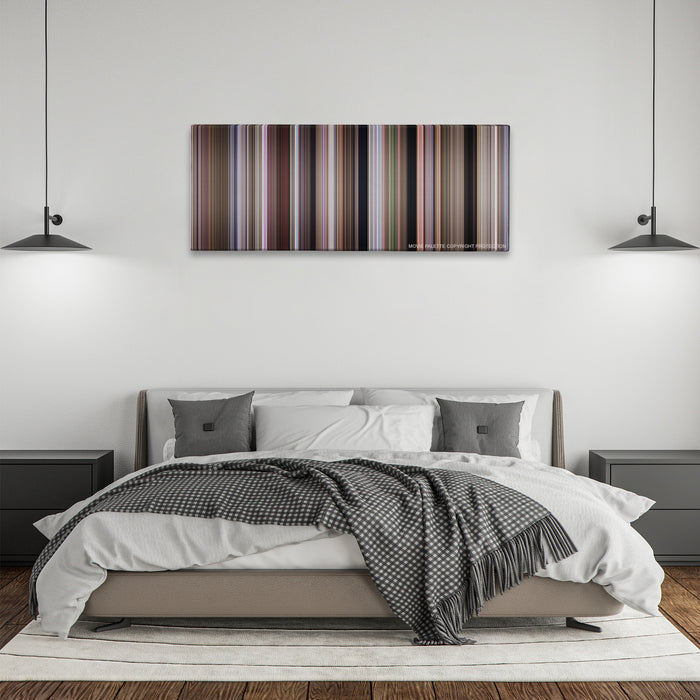 Dr. No color palette canvas above a bed, between two black pendant lamps