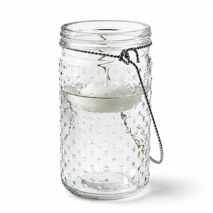7.5 inch hanging dotted glass jar with handle and a floating candle inside