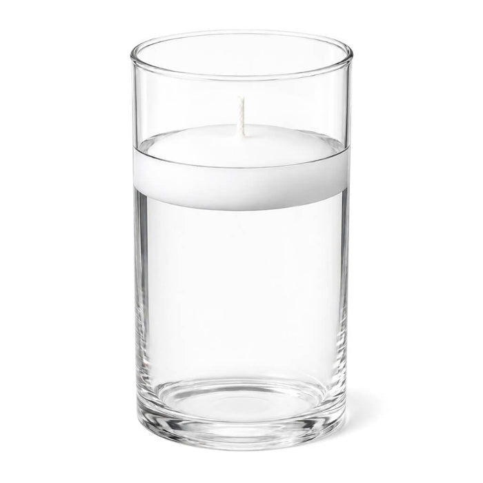 A 3.25"x6" clear glass cylinder holder containing a white floating candle
