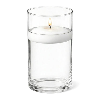 A 3.25"x6" clear glass cylinder holder containing a burning floating candle
