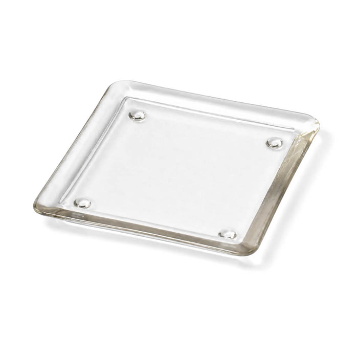 5" square glass pillar plate on a white backdrop