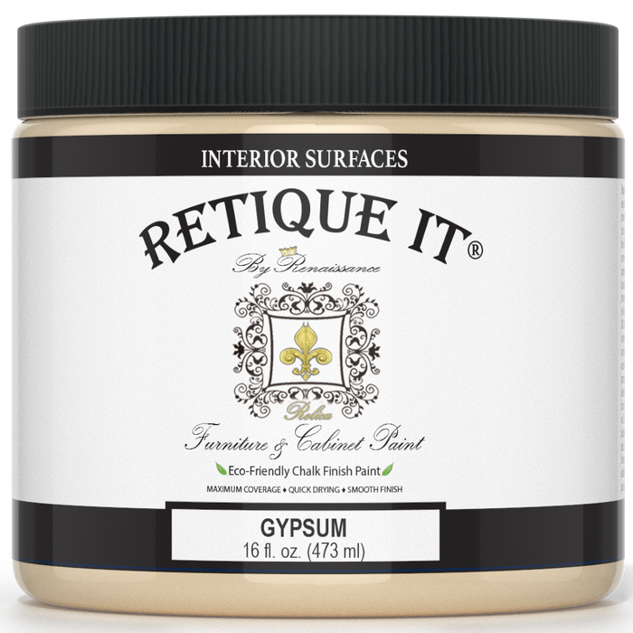 Retique It furniture and cabinet paint in a quart container, designed for gypsum surfaces, shown in a natural setting.