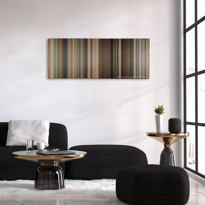 Hairspray color palette canvas above a black sofa with a gold-topped table