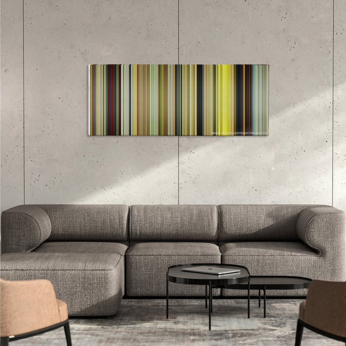 Kong: Skull Island color palette canvas on a concrete wall above a gray sectional sofa