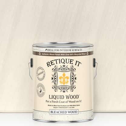 Liquid Wood bleached interior paint by Retique It in a 128oz container, showing a smooth, painted wood surface.