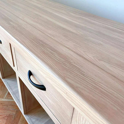 Retique It Liquid Wood 16oz in Bleached for interior furniture projects, shown on a dining room set.