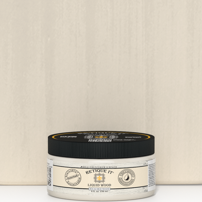 Retique It Liquid Wood 8oz Bleached interior paint jar positioned in front of a color swatch, showcasing the product and color sample.