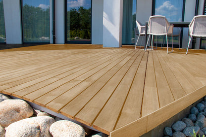 Retique It Multi-purpose Smooth Finish Kit in Pecan for exterior wood projects, featuring a matte top coat on decking.