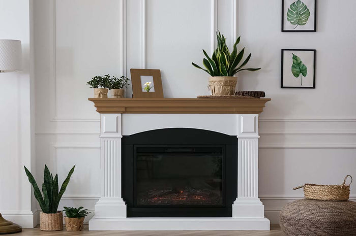 Retique It Multi-purpose Smooth Finish Kit in Dark Oak for interior wood projects, shown on fireplace mantel in the image.
