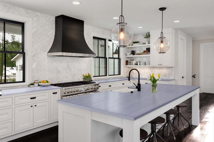 Retique It Multi-purpose Smooth Finish Kit (Med) in Vintage Blue for wood and furniture, shown on a kitchen countertop.