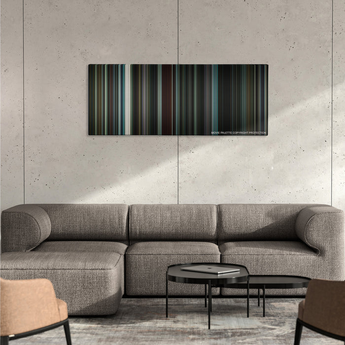 Nightcrawler color palette canvas on a concrete wall above a gray sectional sofa