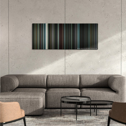 Nightcrawler color palette canvas on a concrete wall above a gray sectional sofa
