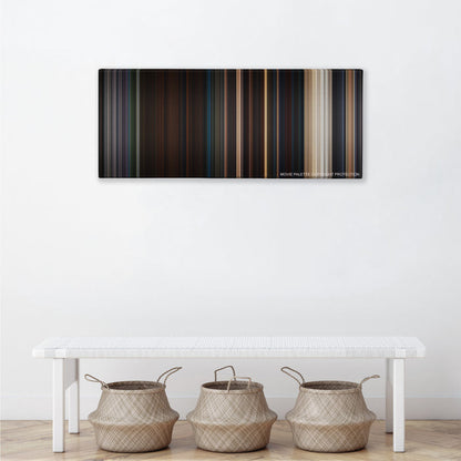 Planet of the Apes color palette canvas above a white bench with three woven baskets