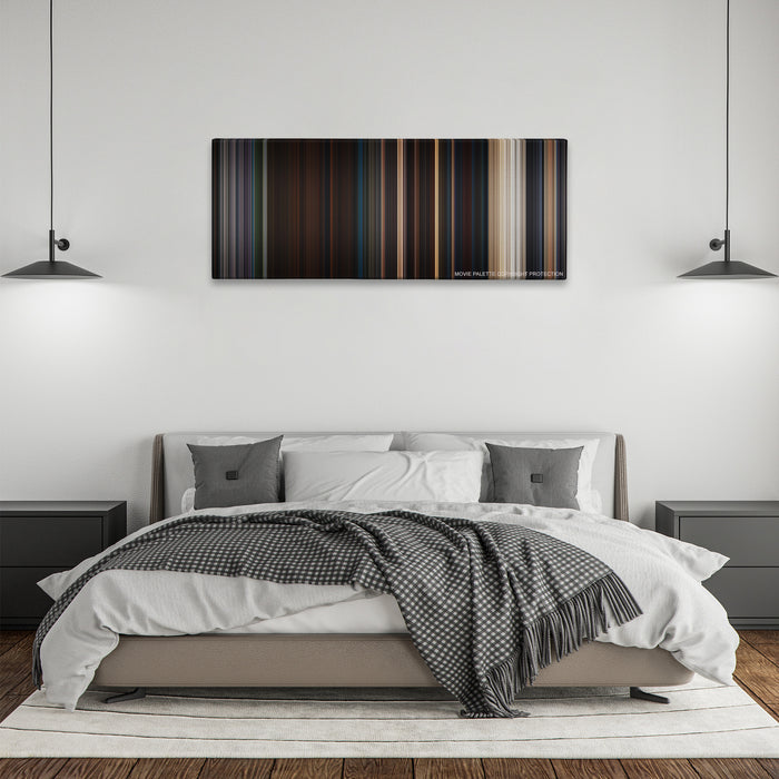 Planet of the Apes color palette canvas above a bed, between two black pendant lamps