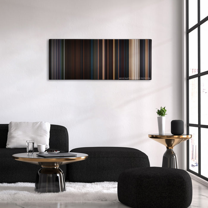 Planet of the Apes color palette canvas above a black sofa with a gold-topped table