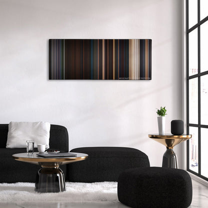 Planet of the Apes color palette canvas above a black sofa with a gold-topped table