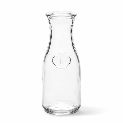 8" Milk Bottle Vase made of clear glass on a white background