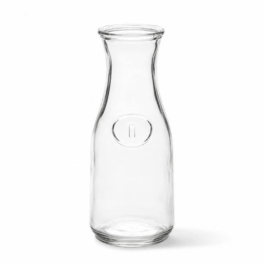 8" Milk Bottle Vase made of clear glass on a white background