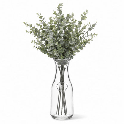 8" Milk Bottle Vase with a bundle of green eucalyptus stems