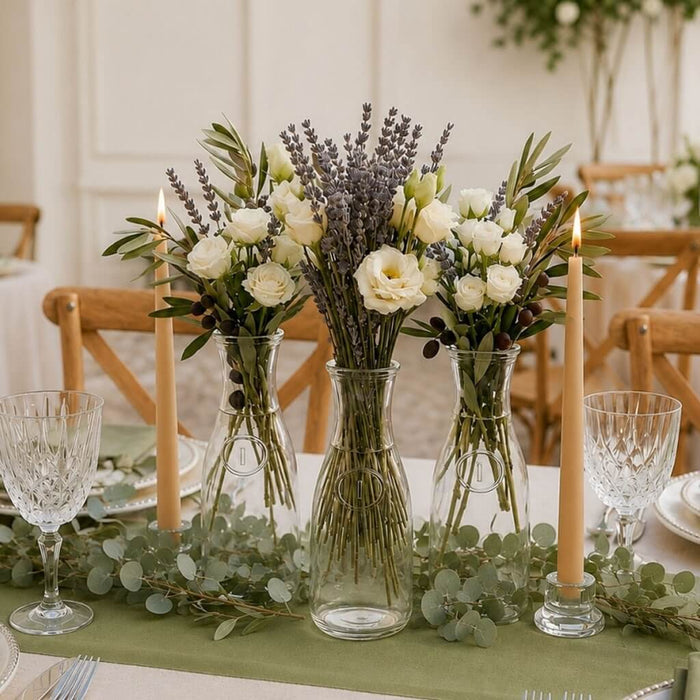 8" Milk Bottle Vase set with lavender and white roses on a garden-themed table