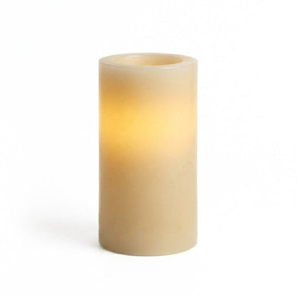 Glowing Flameless LED pillar candle 3x6 ivory on white background