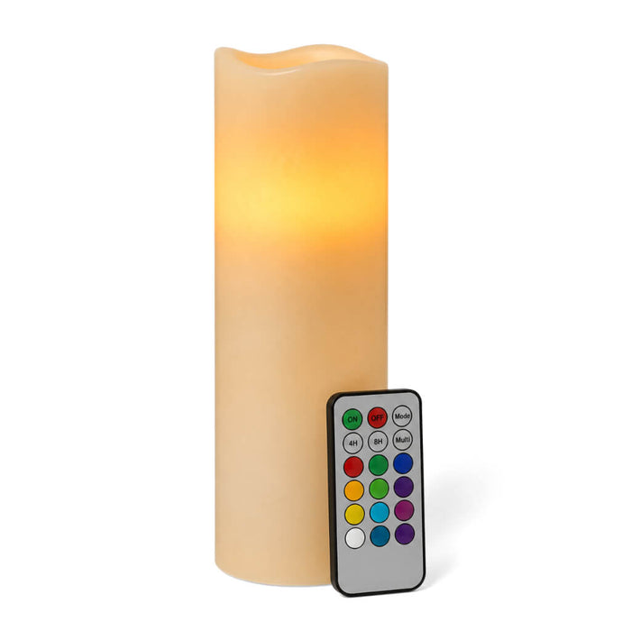 Glowing orange LED candle with remote on white background