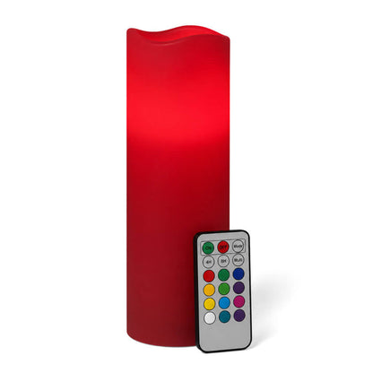 Glowing red LED candle with remote isolated on white
