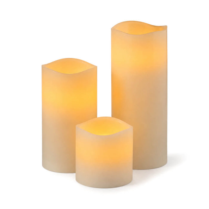 Three different size Flameless LED Wavy Top Pillar Candles with warm glow
