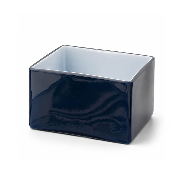 Navy blue square vase with a white interior