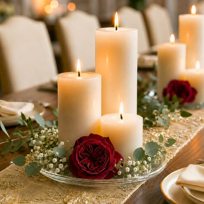 8" Round Glass Pillar Plate with lit candles and a red rose on a tablescape
