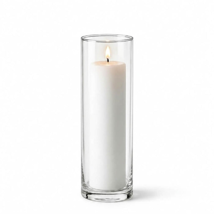 Lit white pillar candle in a Cylinder Vase 3" x 11.75"