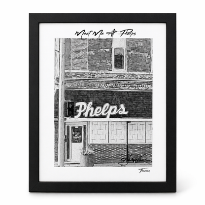 Framed black and white print of a building facade with 'Phelps' sign.