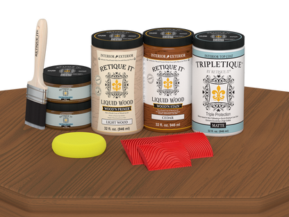 Retique It Wood'n Finish Kit in cedar stain with four large matte wood stain bottles displayed on a table.
