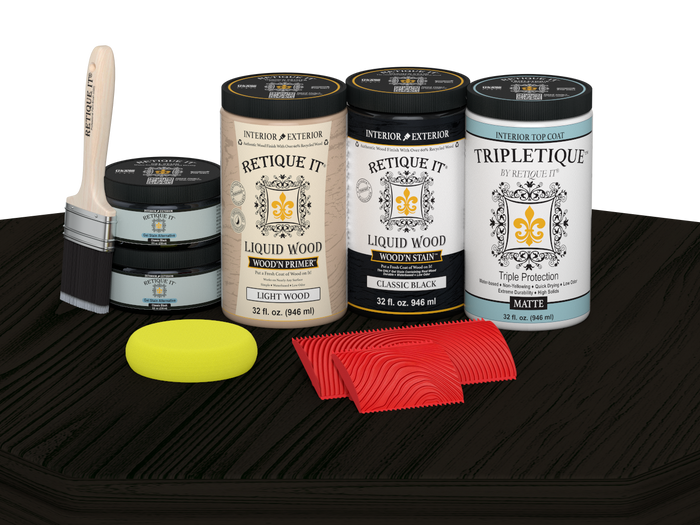 Retique It Wood'n Finish Kit with four large black stain bottles and matte finish on a table surface.