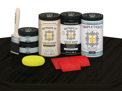 Retique It Wood'n Finish Kit with four large black stain bottles and a glossy finish on a wood tabletop surface.